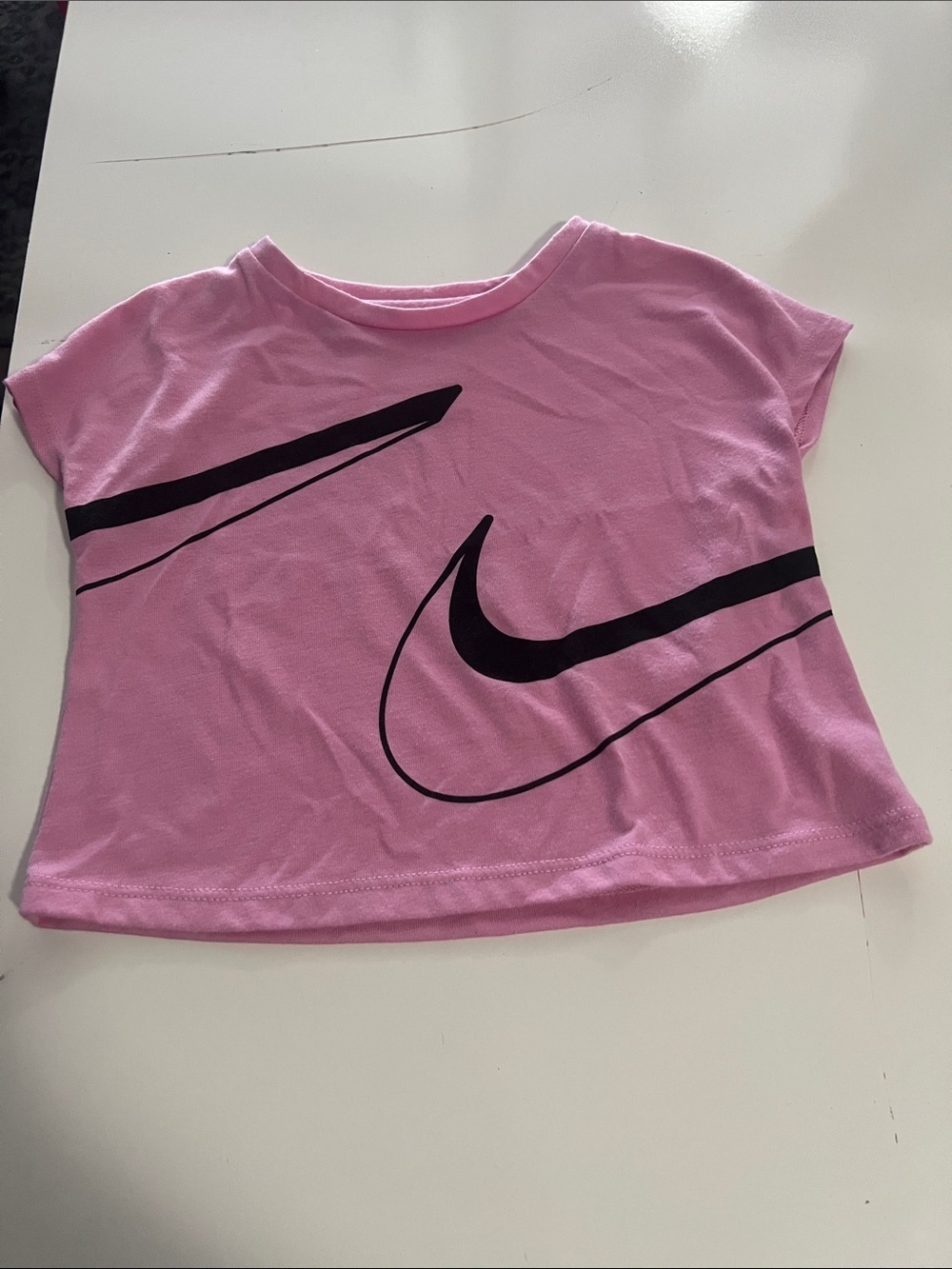 Nike Pink Tee with Black Swoosh Graphic